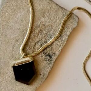 Gold Necklace with Black Pendant by Jax Kelly